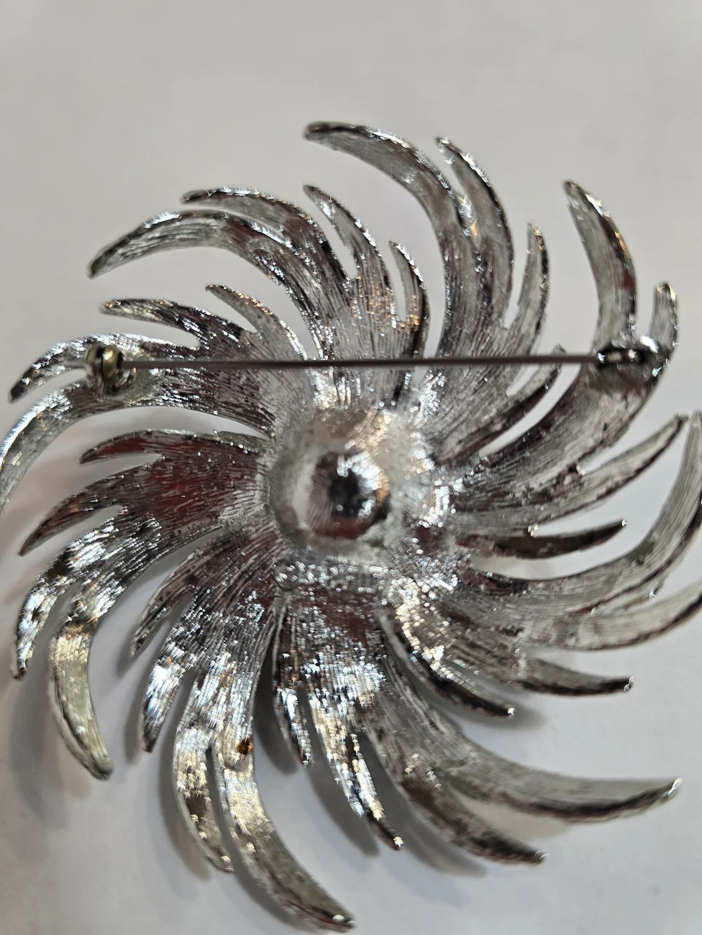 Sarah Coventry Silver-tone Swirl Brooch with Pearl Center